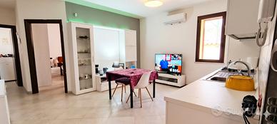 Appartamento con cortile e posto auto