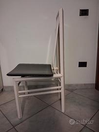 sedia in legno con seduta in pelle