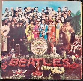 Sgt. Pepper’s Lonely Hearts Club Band- The Beatles