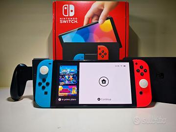 Nintendo Switch Oled (perfetta) + volanti Nintendo