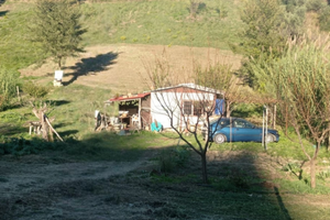 Terreno con prefabbricato/casa singola