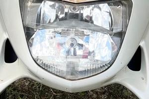 Faro anteriore + sella Honda Pantheon  (1998-2003)