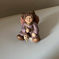 Angelo thun con coccinella