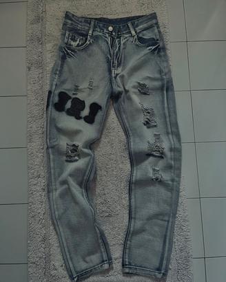 Jeans Amiri slim fit com ricami neri taglia M