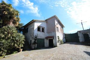 Casa singola con corte