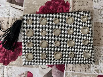 Borsetta a mano con occhielli