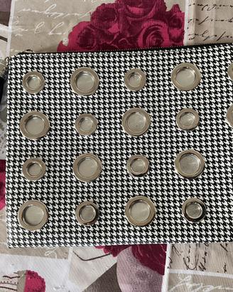 Borsetta a mano con occhielli