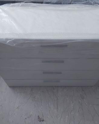 como e comodini colore bianco