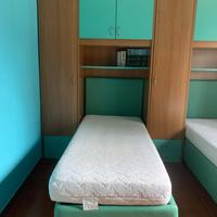 Letti contenitori con testiera in pelle