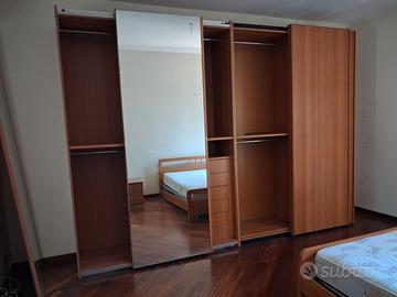 Armadio per camera da letto a 4 ante scorrevoli