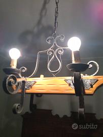 Lampadari vetro,legno ferro battuto e ottone