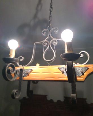 Lampadari vetro,legno ferro battuto e ottone