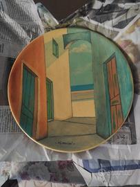 piatto decorativo in ceramica 