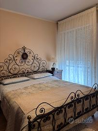 Letto antico in ferro battuto