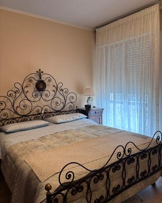 Letto antico in ferro battuto