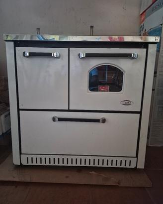 stufa cadel con forno e cestone porta legna.