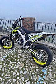 TM 125