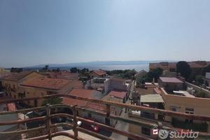 Mili, panoramico 110 mq con posto auto e cantina