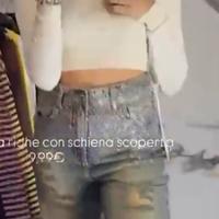 Maglia crop a righe con schiena scoperta