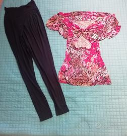 Blusa rosa elasticizzata e pantalone corsaro.