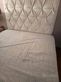 testiera letto in pelle.