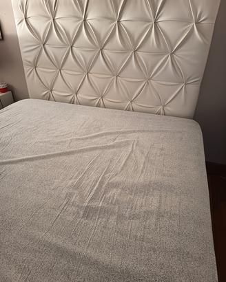 testiera letto in pelle.