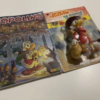 Topolino con statuetta Zio Paperone nel Klondike