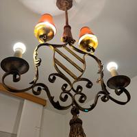 Lampadario spagnolo antico dorato.