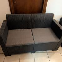 Salotto da giardino in rattan con cuscini