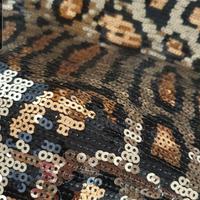 Tessuto con paillettes micro