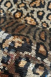 Tessuto con paillettes micro