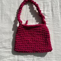 Borsa all’uncinetto magenta