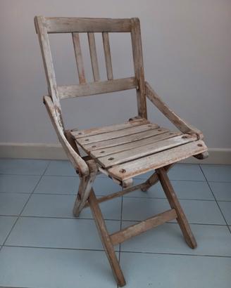 Sedia pieghevole vintage in legno anni 60