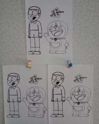 Tre Stampe & due Sorpresine Kinder "Doraemon"