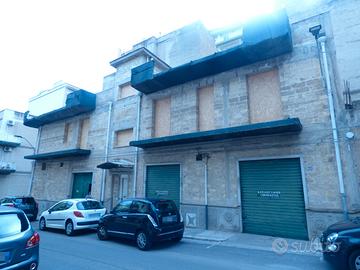 Intero edificio allo stato grezzo P/22