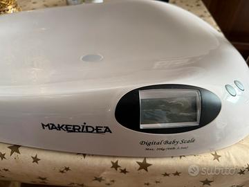 Bilancia pesa neonati