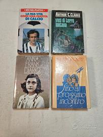 lotto 4 libri. ancora in celofan.