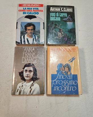 lotto 4 libri. ancora in celofan.