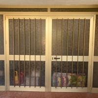 c e r c o portone in metallo