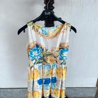 Abito sbracciato con disegno barocco