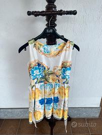 Abito sbracciato con disegno barocco