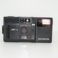 Olympus AF-1, testata