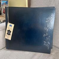 Album fotografico con fiori argentati in cuoio