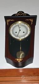 Orologio a pendolo da parete
