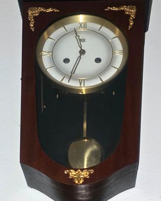 Orologio a pendolo da parete