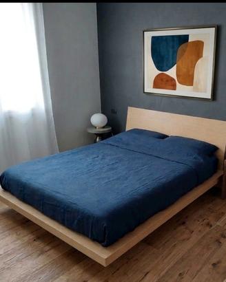 Letto matrimoniale  effetto rovere con doghe.