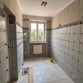 Posa piastrelle in bagno, cucina e pavimenti di ca