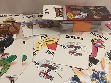 Carte album  Mercante in fiera e gioco Clementoni
