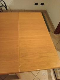 tavolo in legno con prolunghe 