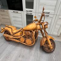 moto intagliata in legno vintage